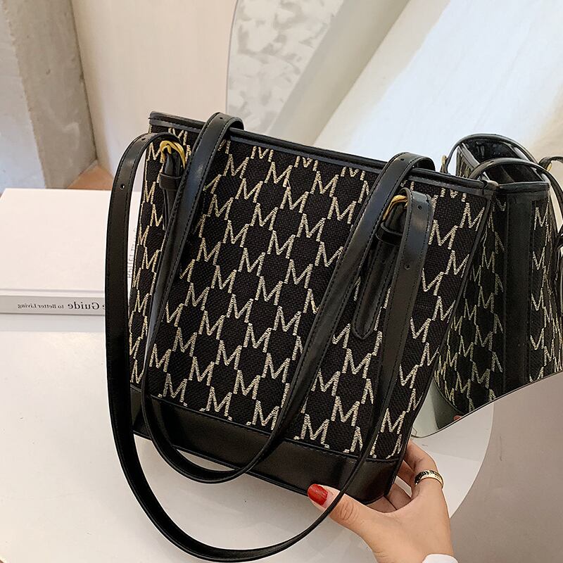 シンプルなレディースビッグバッグ2020人気の新しい流行のファッションネットレッド大容量ワイルドインシングルショルダーバケットバッグ Tiancai_Wing_Bag80659717904