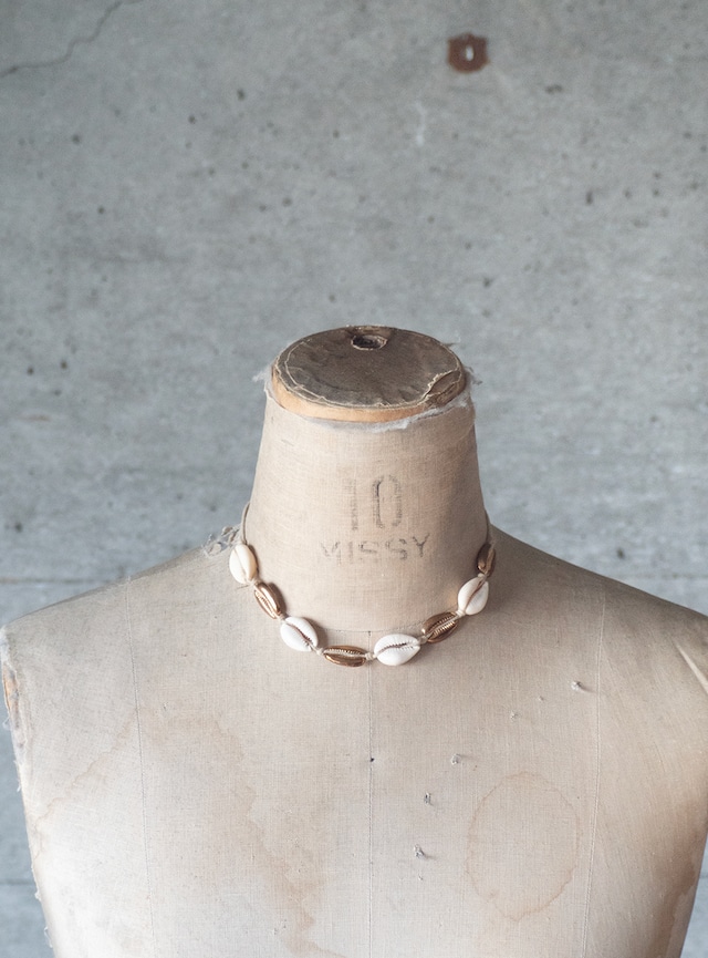 unknown used Cowrie and brass necklace