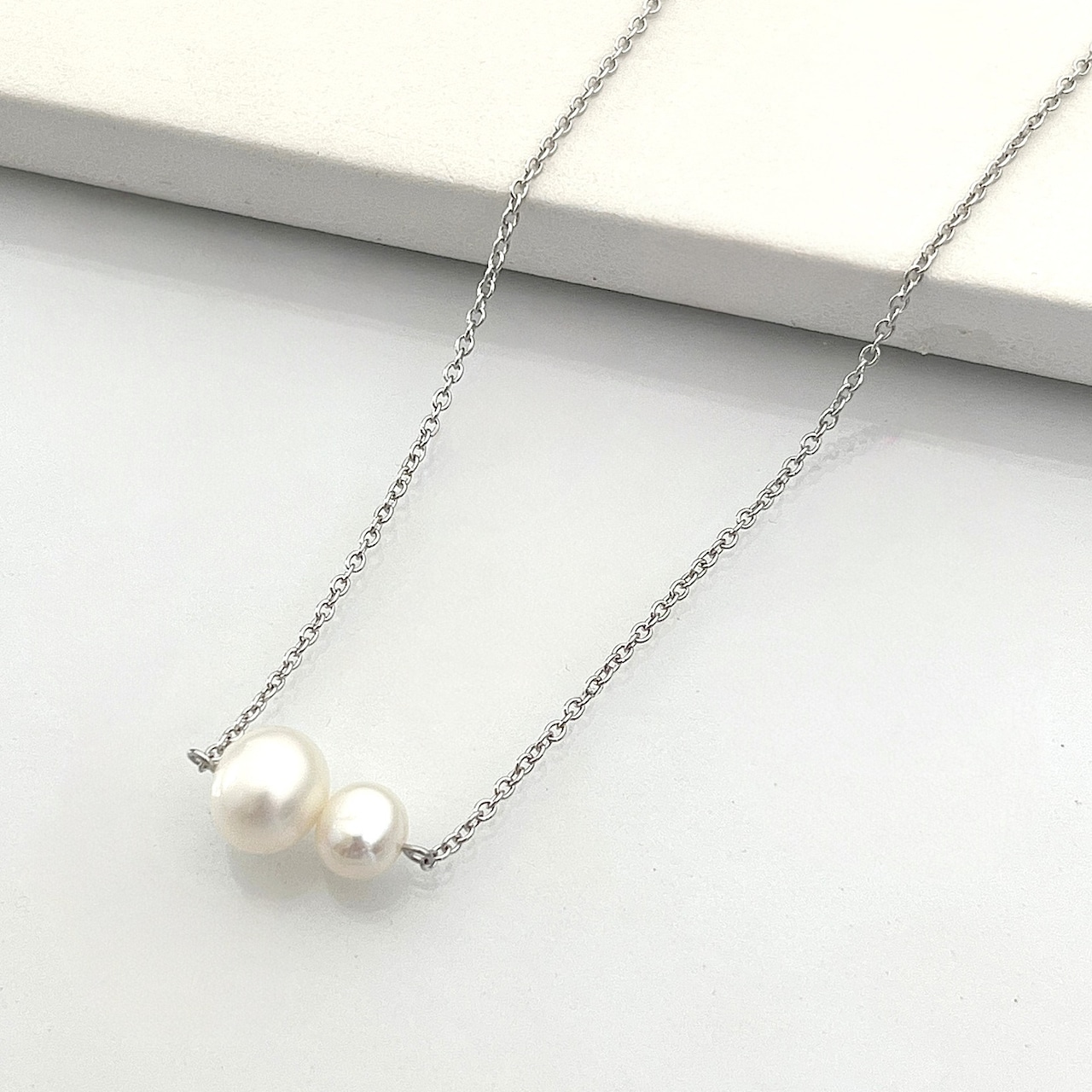 二見結ひ 真鍮ペンダント(淡水バロック真珠8.0mm、6.0mm)