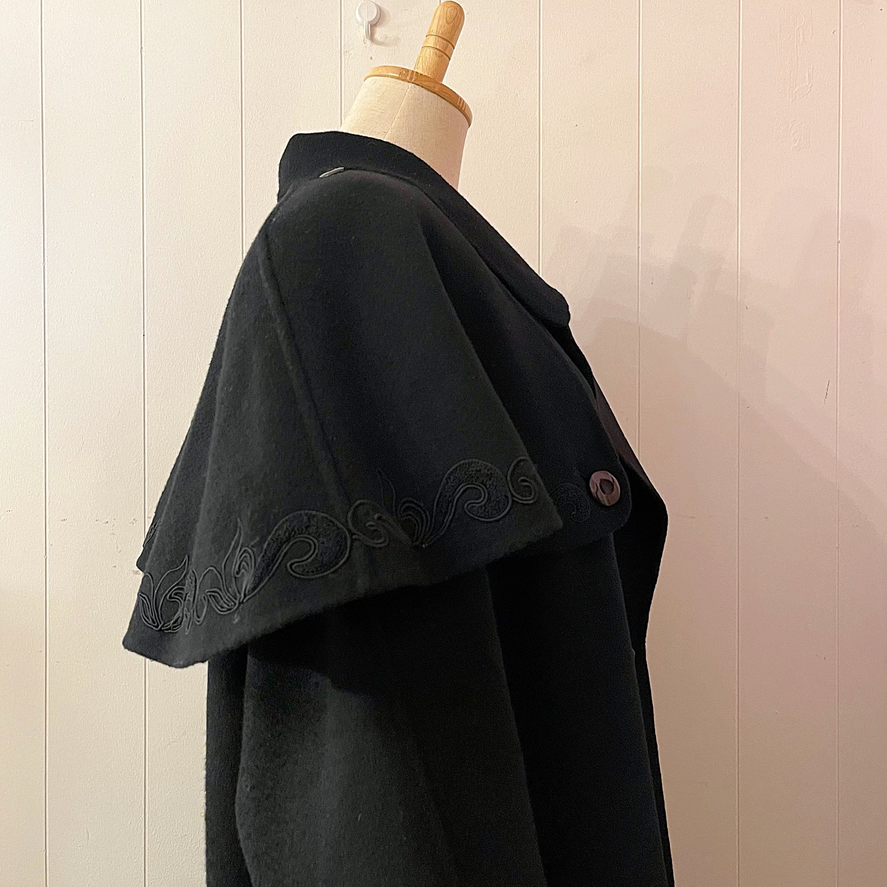 black cape chester coat