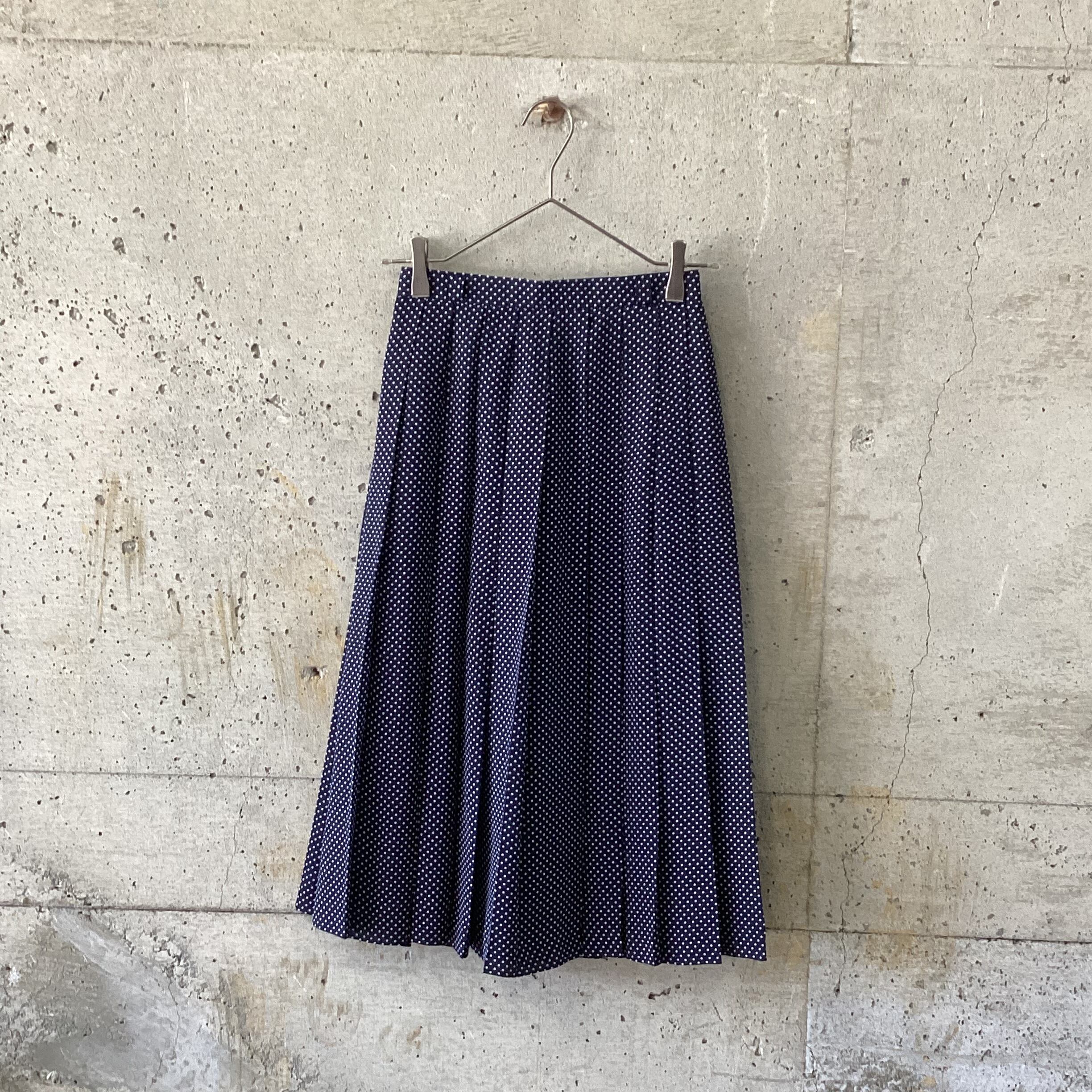 Navy dot pleated skirt