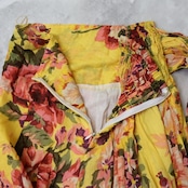 フラダンス 衣装 スカート イエロー系 花柄 バラ フラワープリント リボン かわいい 鮮やか 華やか 軽やか 透け感 レッスン 練習 ピンク系 レッド系 グリーン系 パープル系 ホワイト系 黄 赤 緑 紫 白 フラ ダンス フェミニン おしゃれ エレガント ダンスレッスン