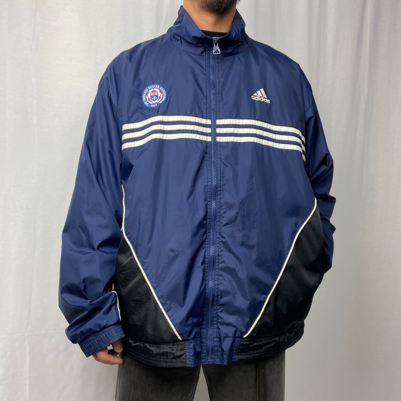 90年代 adidas TEAM アディダス チーム ナイロン トラックジャケット メンズXL相当 古着 90s ビンテージ ヴィンテージ  パフォーマンスロゴ サッカー 切り替えデザイン ネイビー ブラック 紺色 黒色【ナイロンジャケット】【SS2401-30】 | cave ...