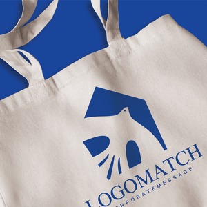 飛び立つ鳥と幸せの家のロゴ