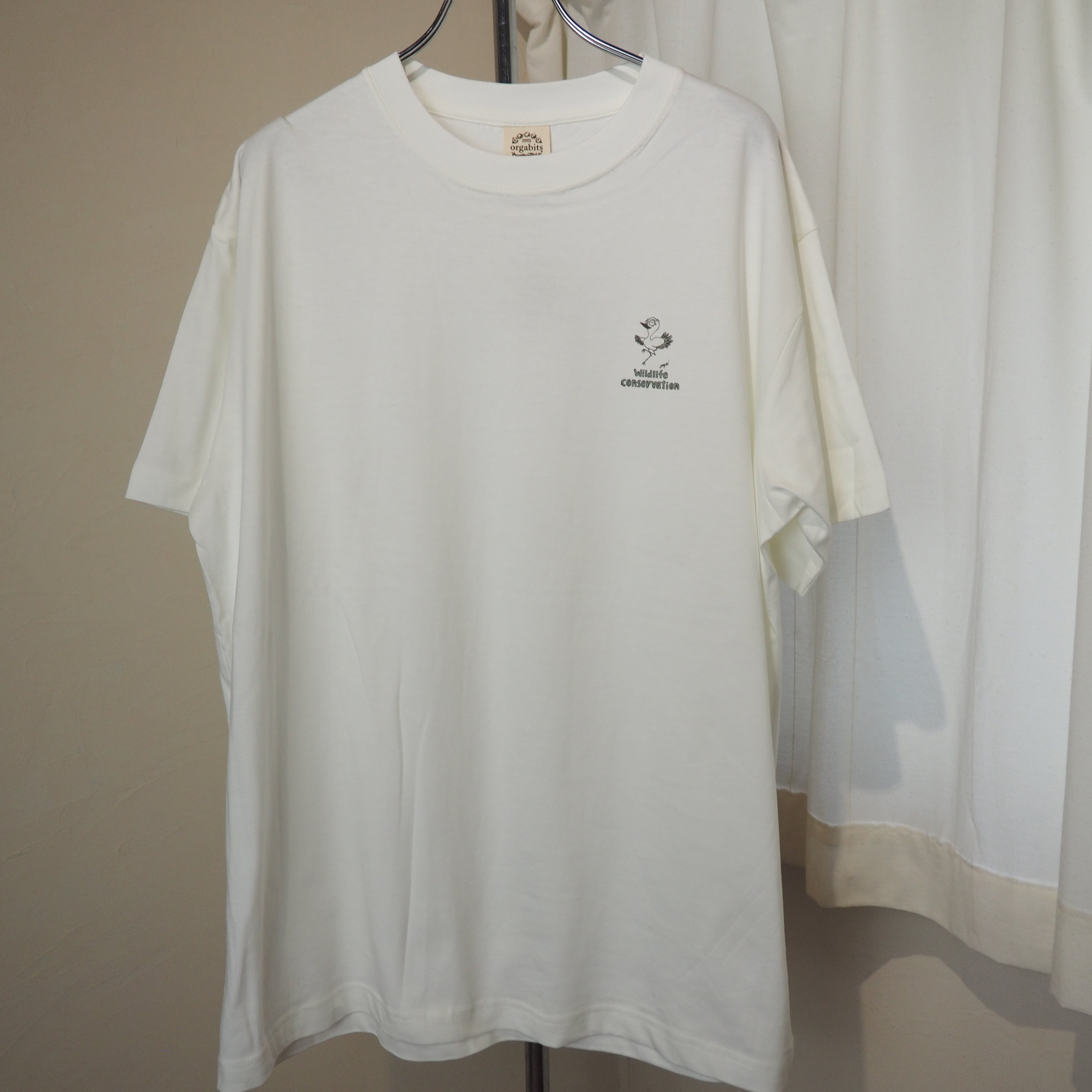INSTERRA wildlife conservationオーガニックコットンTシャツ「コウノトリ」ナチュラルホワイト