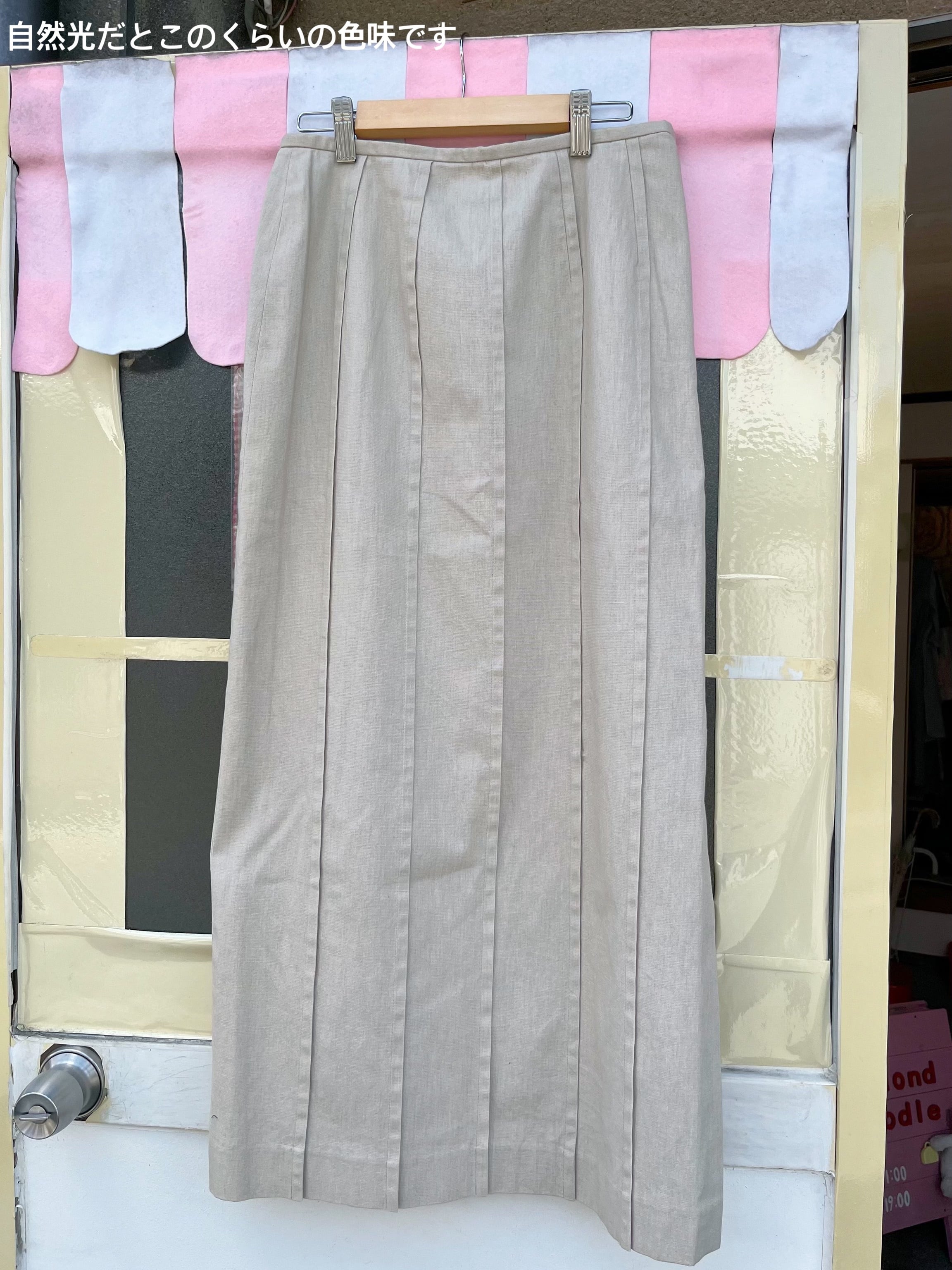 beige pleats side slit long skirt