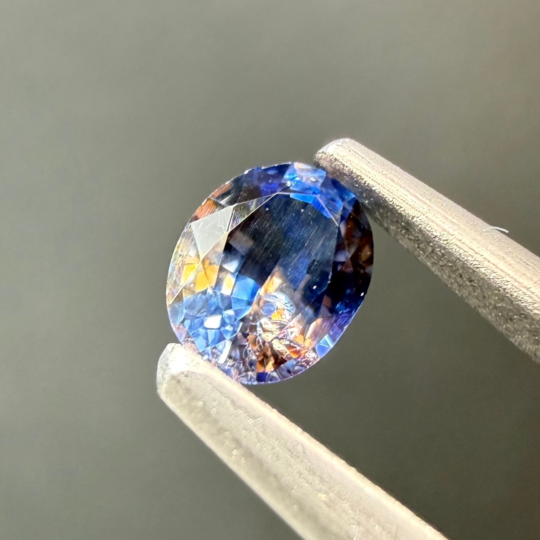 スリランカ産非加熱天然バイカラーサファイア スリランカ産バイカラーサファイアオレンジ×ブルー0.29ct 4.46×3.5