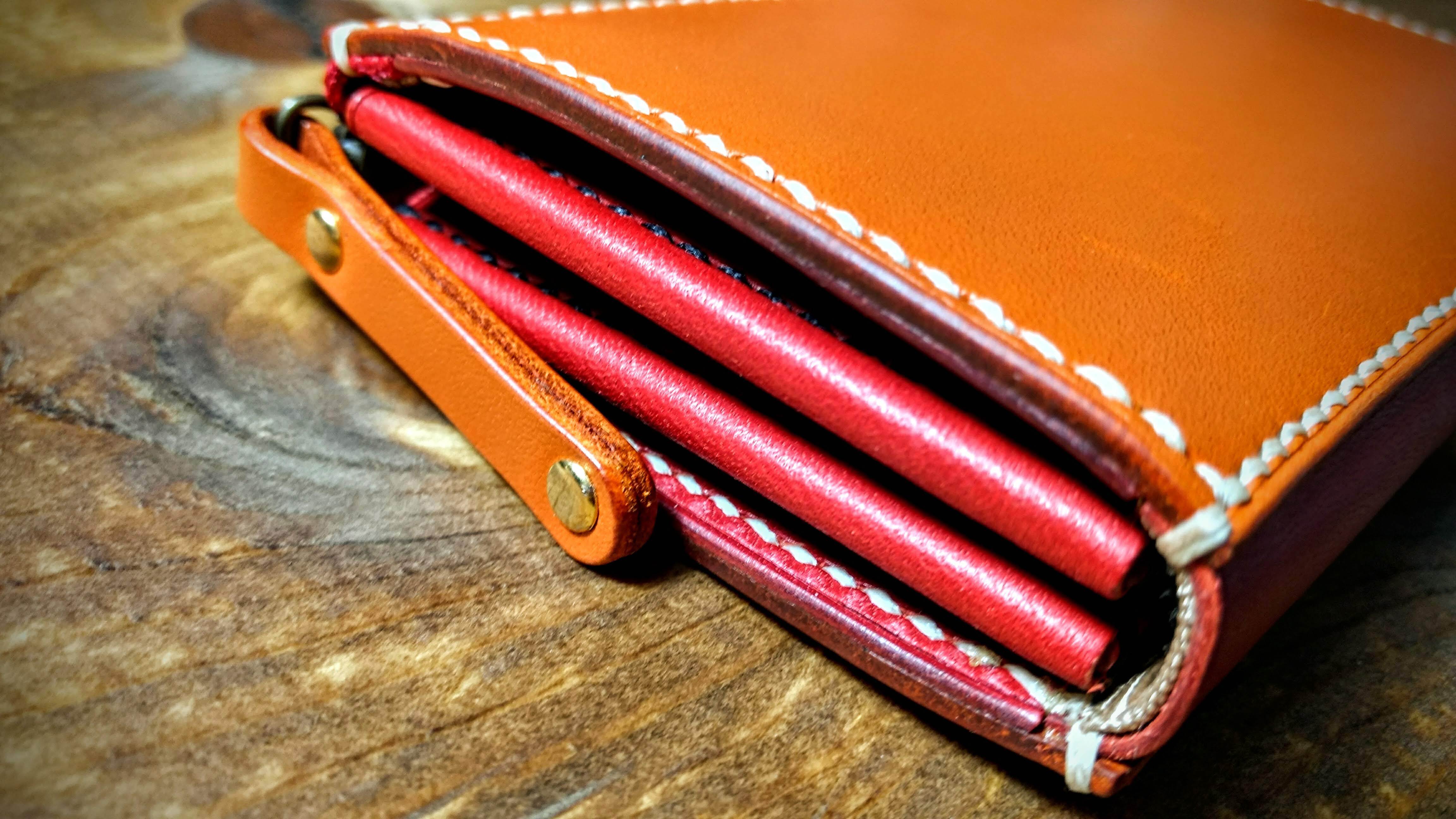 L字ファスナー型長財布 牛本革「ロマーネ革」使用 橙×赤 手縫い財布