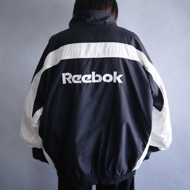 "Reebok"  3-tone switching color back logo design loose silhouette nylon blouson