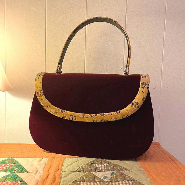 bordeaux ellipse hand bag