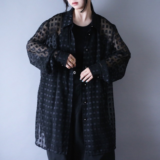 taping block sheer fabric crystal button design over silhouette shirt