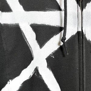 UNFINISHEDアシンメトリーペイントロングスリーブパーカー