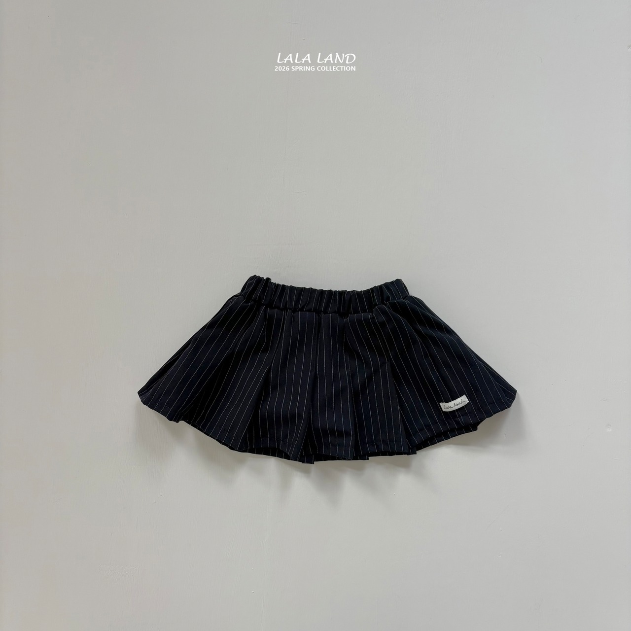 LALALAND 26/SS (Kids)Seamed pleated skirt