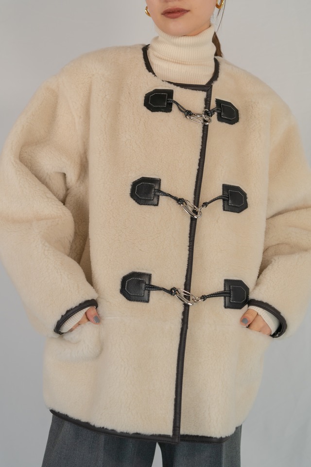 Clasp front shearling coat
