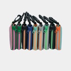 vibram card case (black×orange) with orange glowing zip