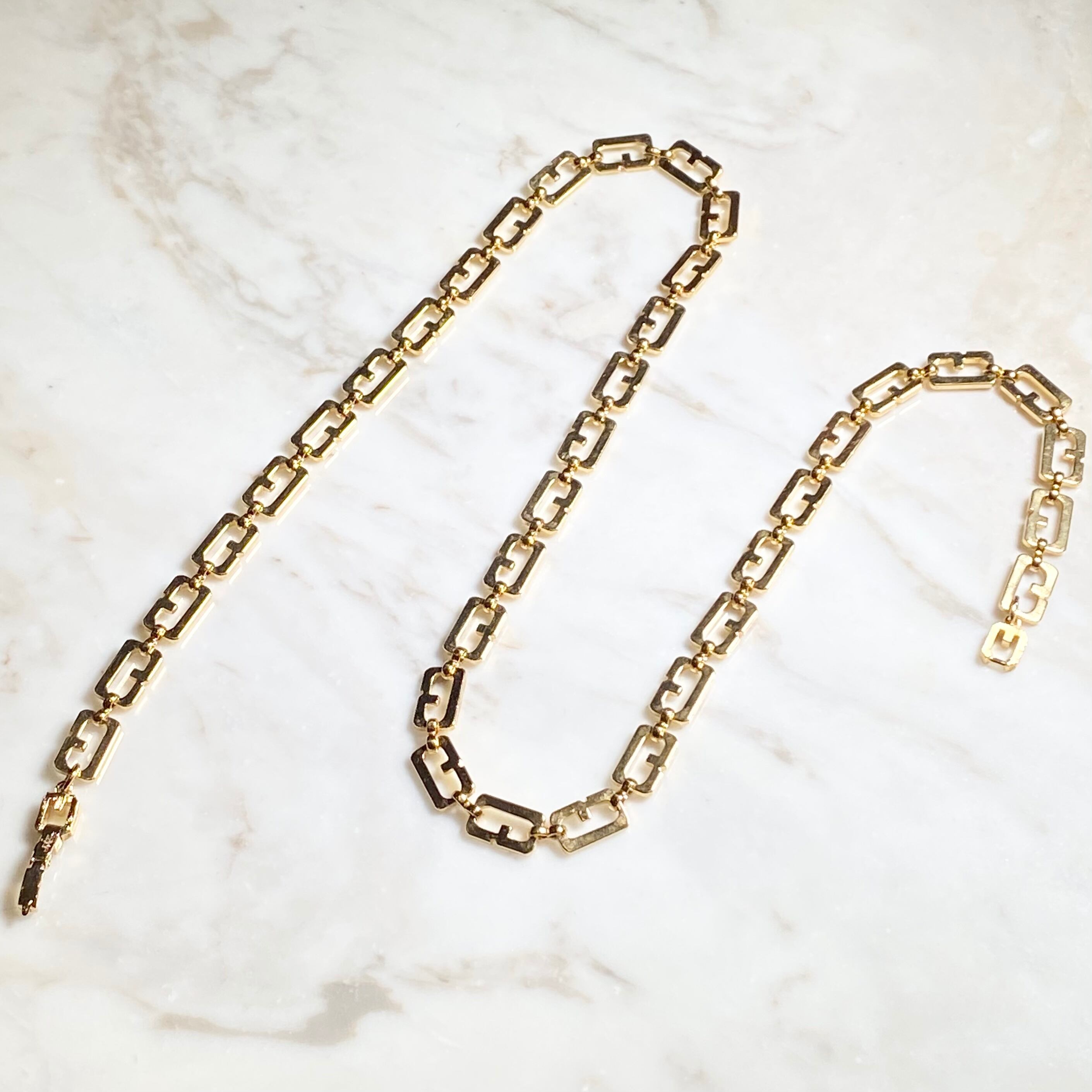 vintage GIVENCHY gold color metal “G” link chain long