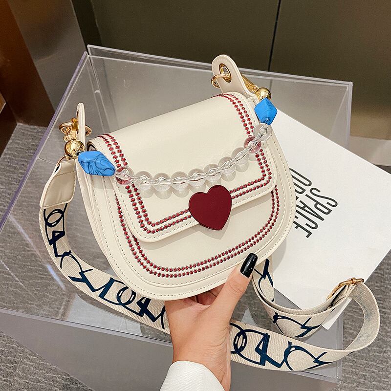 七夕バレンタインデー限定スモールバッグレディース2020ニュートレンディネットレッドファッションワイルドパールクロスボディサドルバッグ Tiancai_Wing_Bag127138157