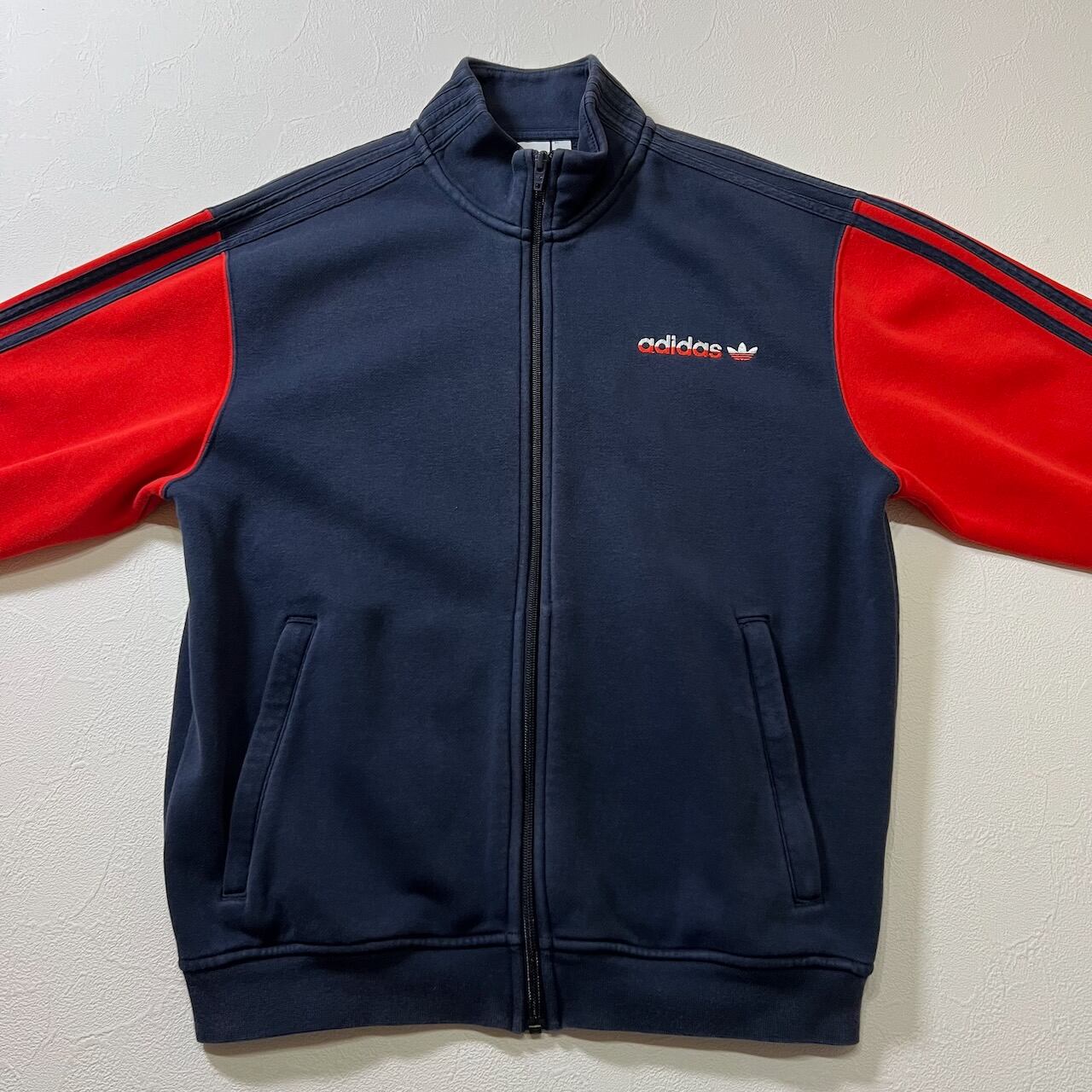 adidas フェード トレフォイル スリーストライプス トラックジャケット