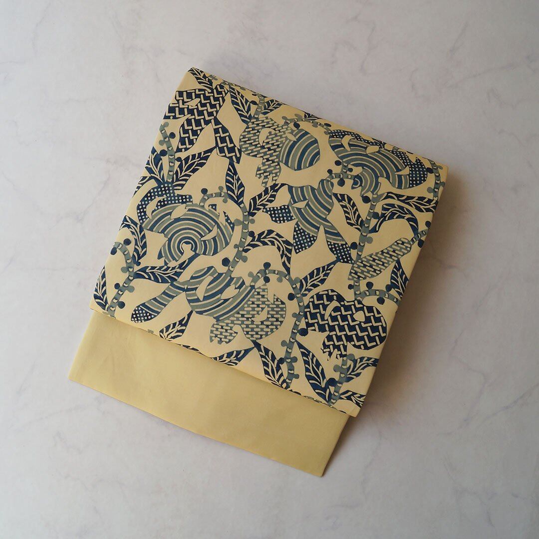 【なごや帯】淡黄色 抽象植物文 型染め 塩瀬なごや帯