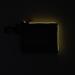 vibram Lzip wallet (silver×clear) with orange glowing zip
