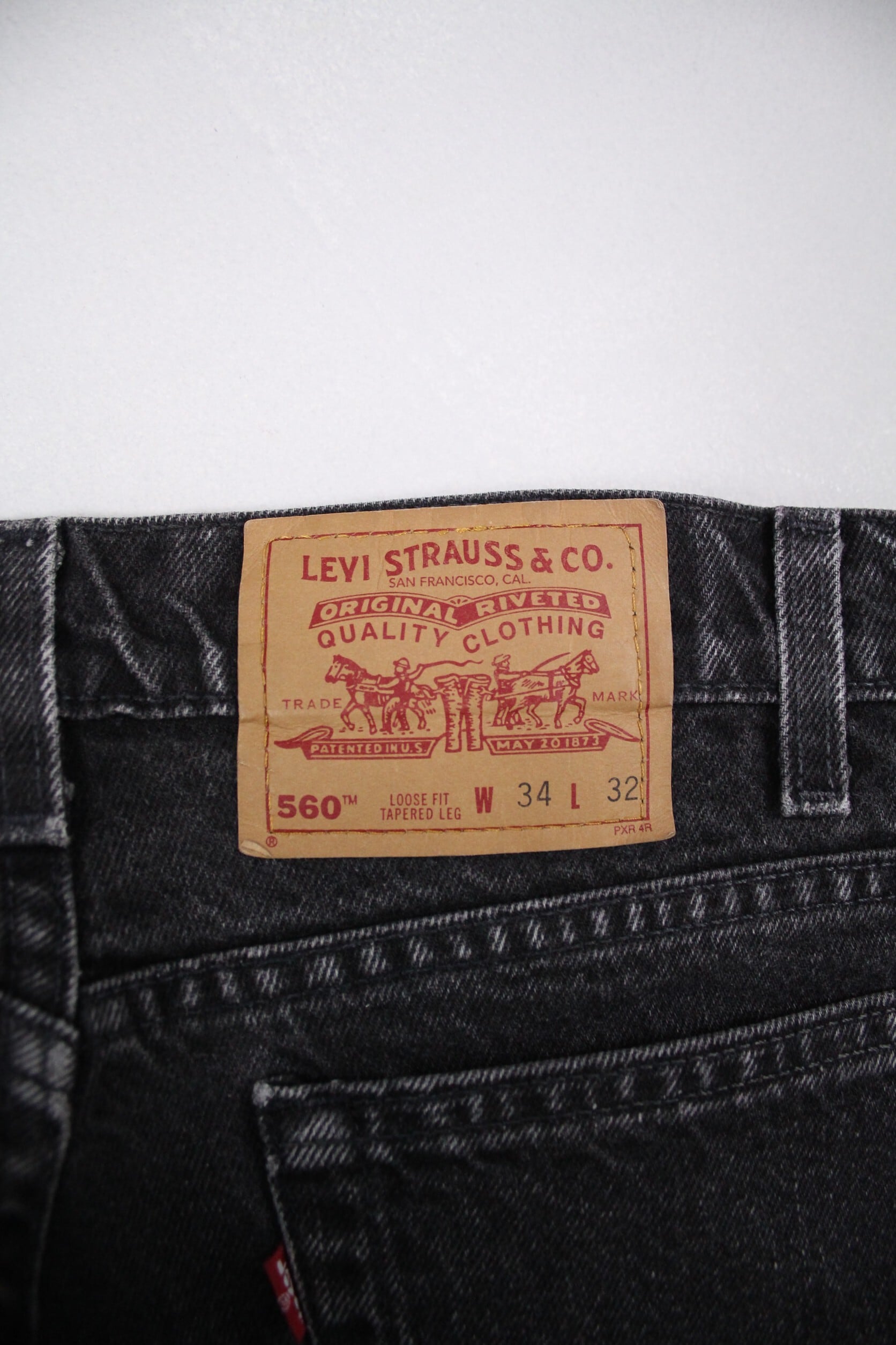 1990's Levi's 560 後染め ブラック テーパードデニムパンツ Made In