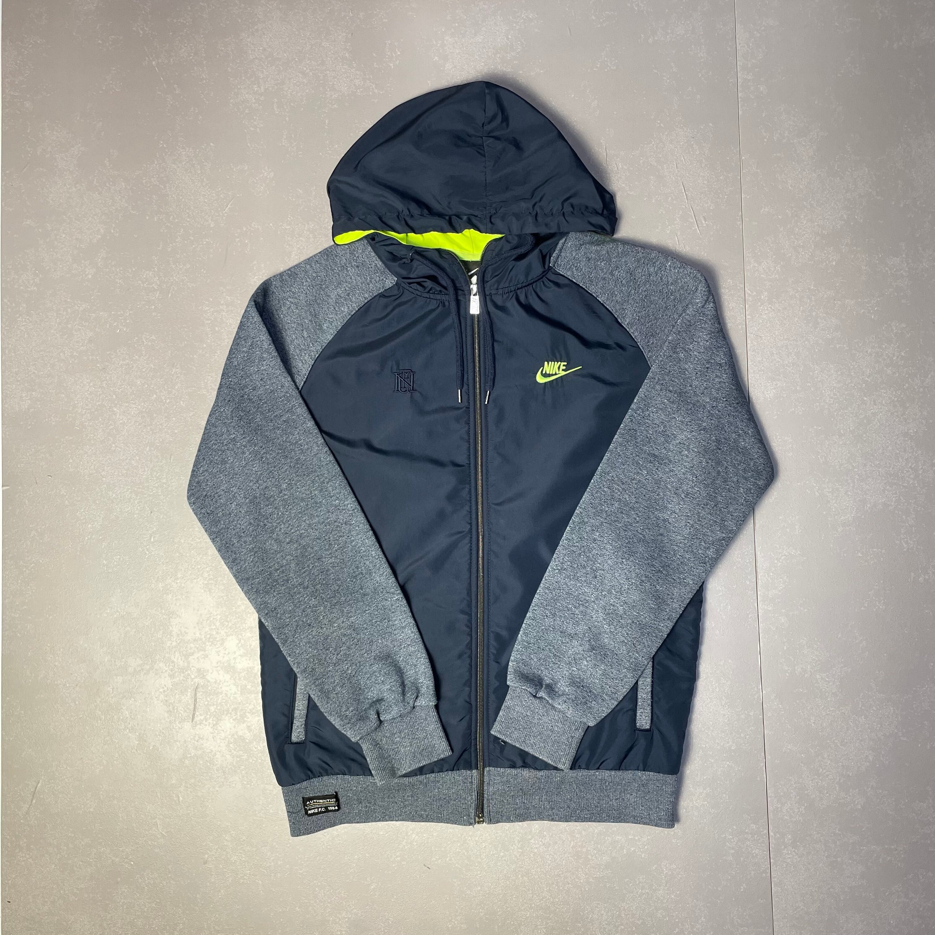 NIKE ナイキ スモールスウォッシュ ロゴ刺繍 切り替えデザインナイロンジャケット メンズL相当 古着 ヴィンテージ ビンテージ ウインドブレーカー ネイビー 紺色 【ナイロンジャケット】