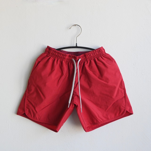 《MOUNTEN. 2022SS》board shorts / brick red / size0 (145-155cm程度)