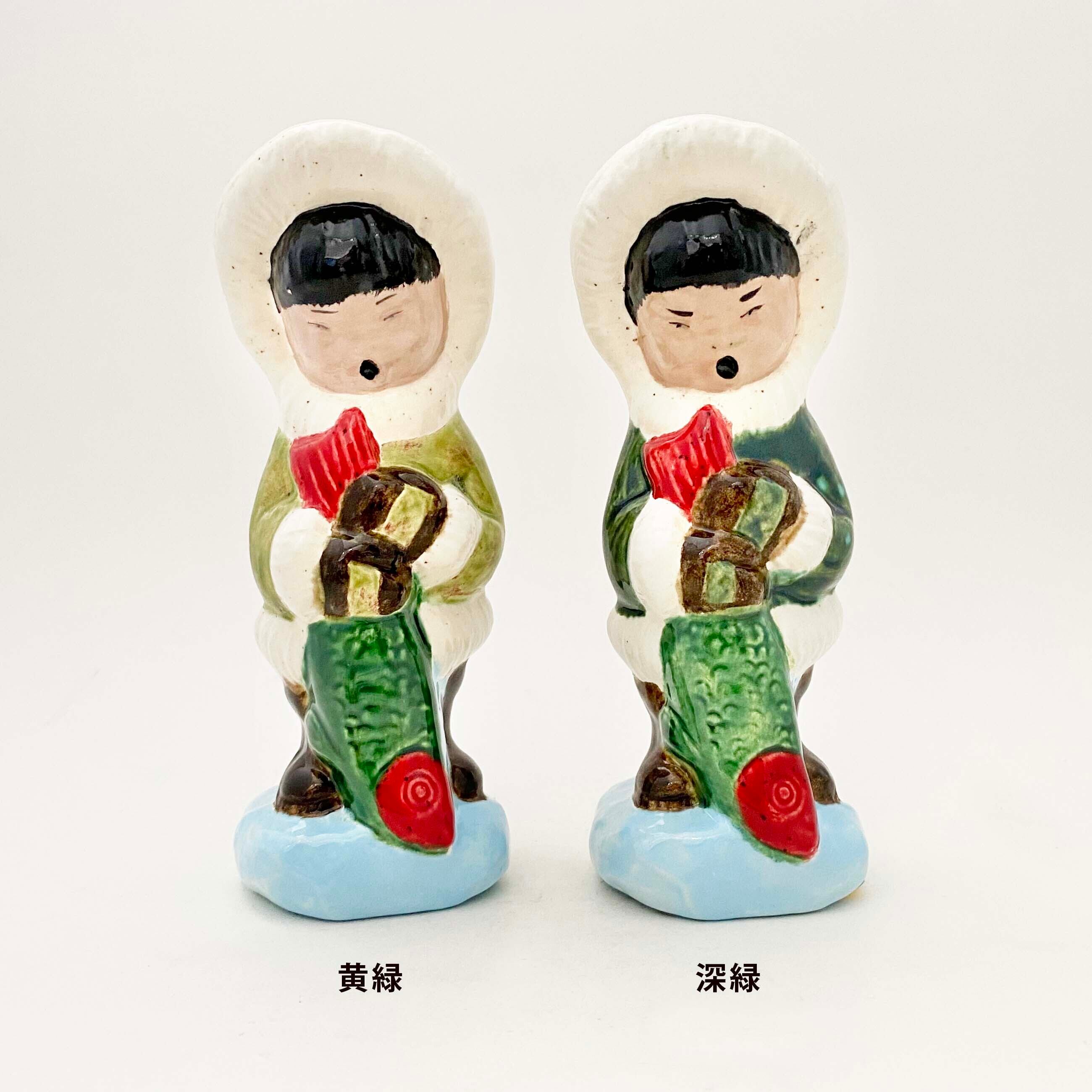 陶器のエスキモーの釣り人（アラスカ土産）