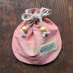 秩父銘仙 巾着袋〈雪花柄 ピンク〉