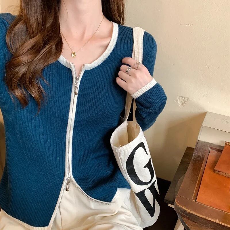 バイカラージッパートップス