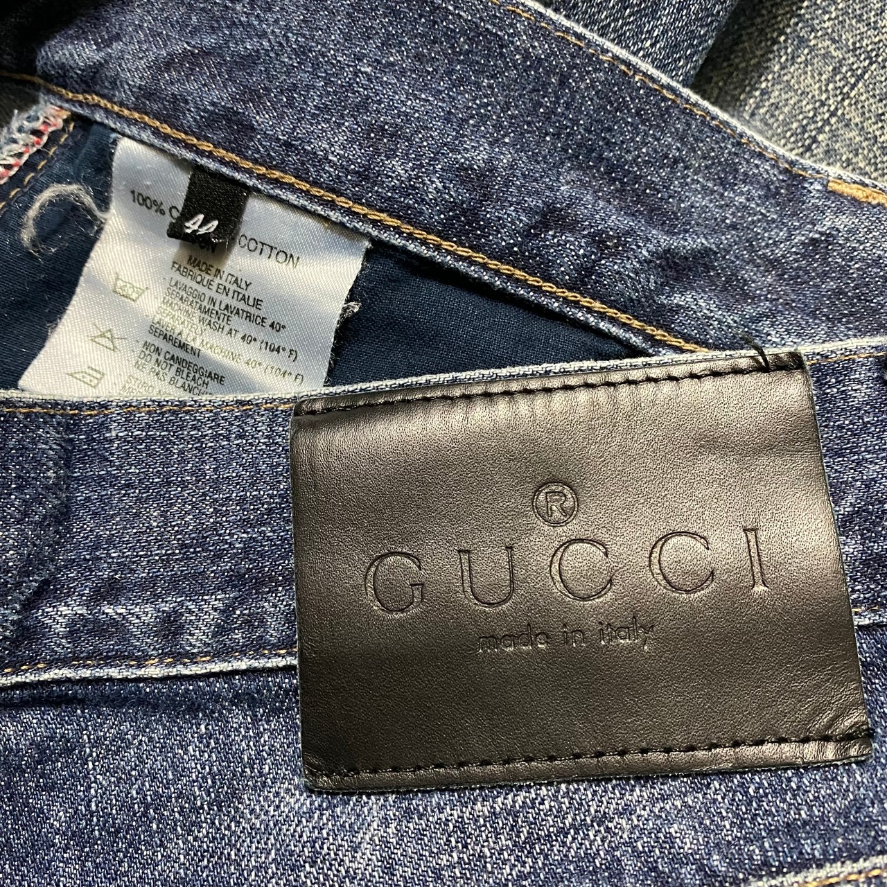GUCCI faded indigo denim skinny pants