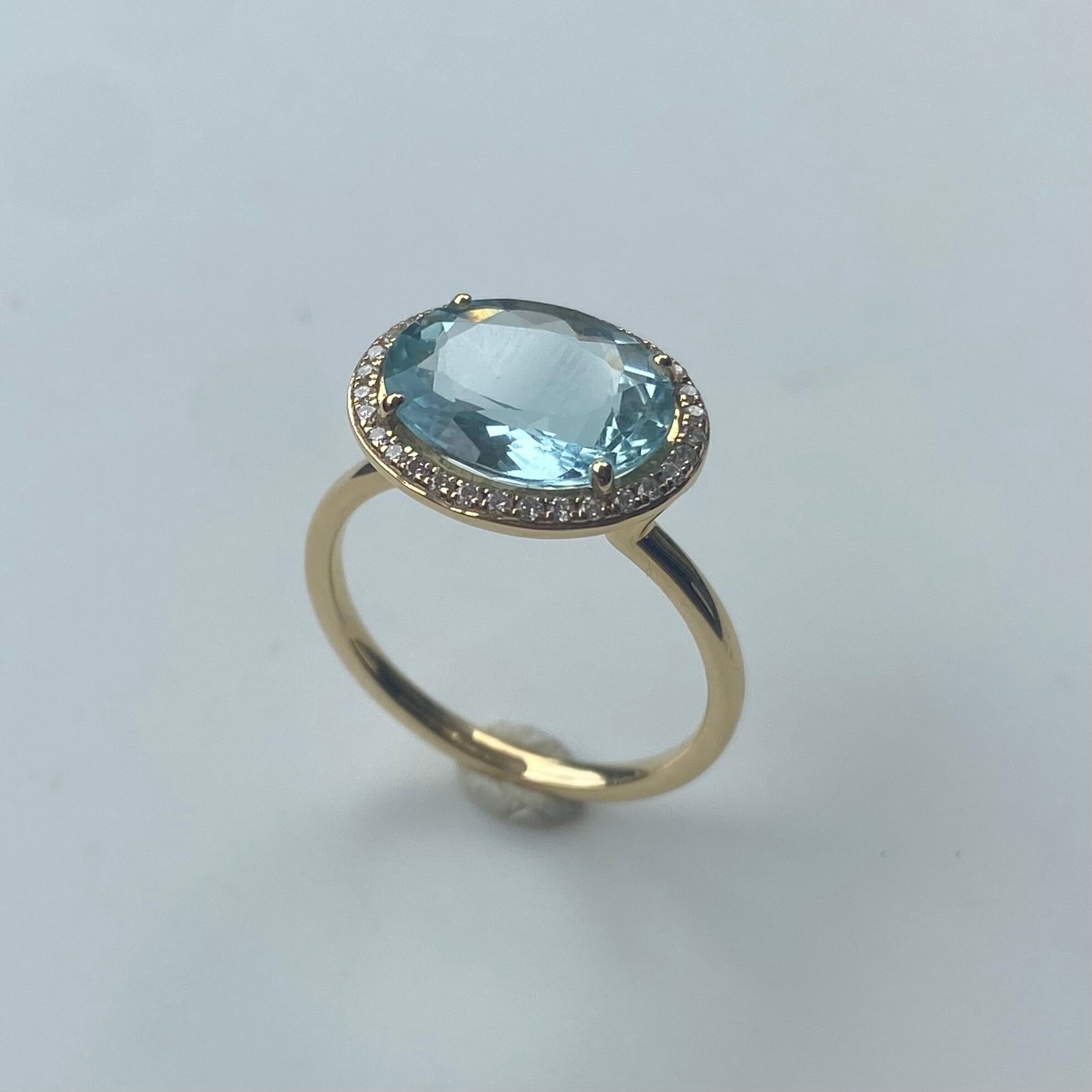 アクアマリン0.60ct きめ細かく ダイヤ0.12ct K18YG イエローゴールド