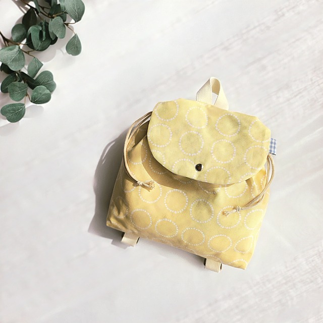 北欧サークルステッチ柄のベビーリュック│クリームイエロー