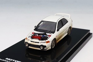 MOTORHELIX / モーターヘリックス 三菱 Lancer Evolution IV Muddy Version with Rally Light M64015