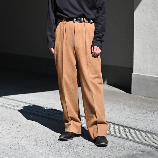INTERIM / NATURAL DYED KATSURAGI WITH LEATHER PIPING 1-TUCK WIDE TAPERED MILITARY TROUSERS INTERIM / NATURAL DYED KATSURAGI WITH LEATHER PIPING 1-TUCK WIDE TAPERED MILITARY TROUSERS