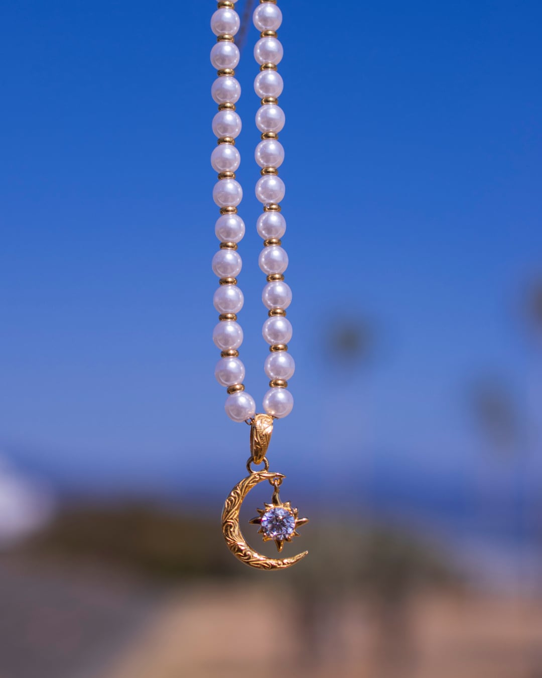 Pearl×sun and moon necklace