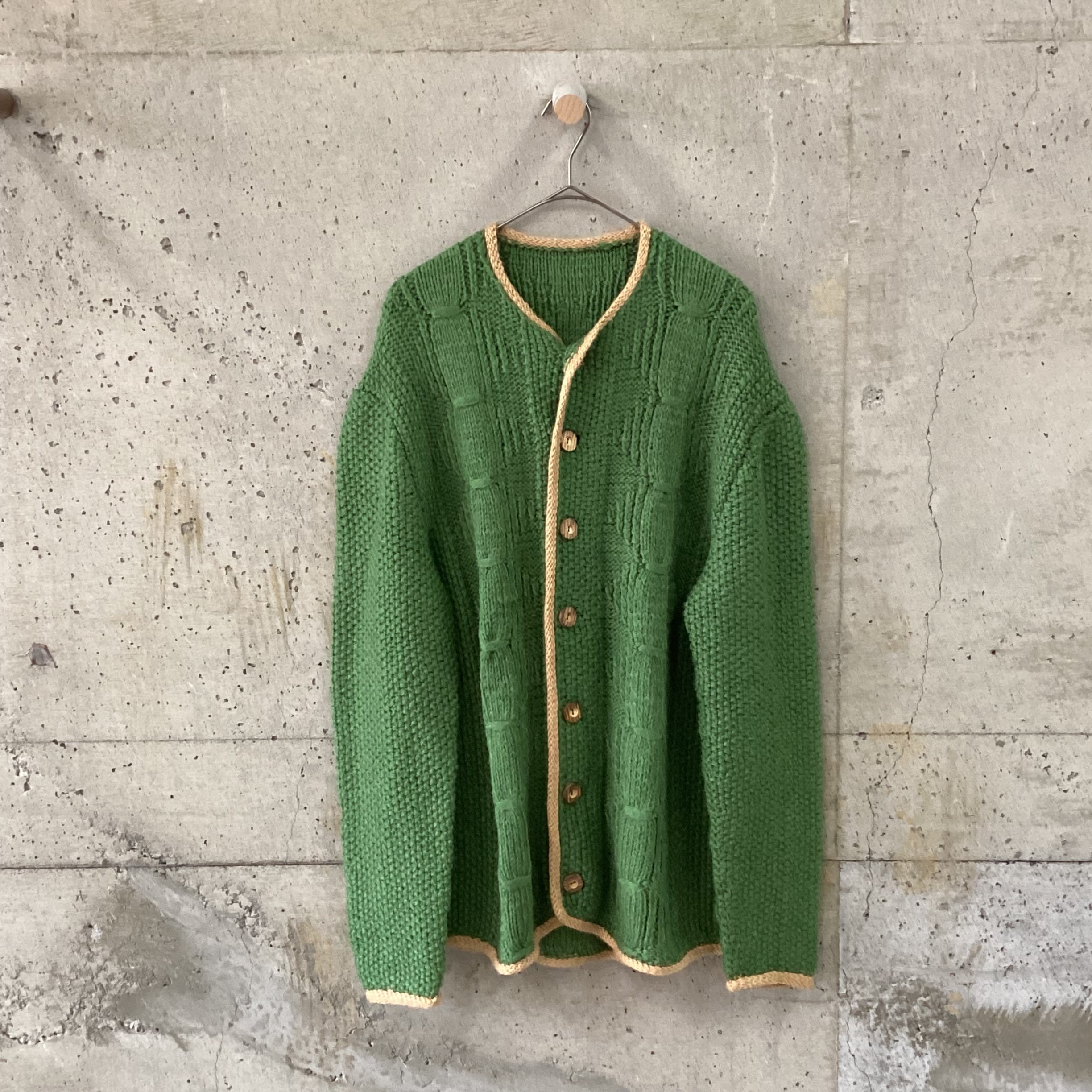 Green hand-knitted cardigan