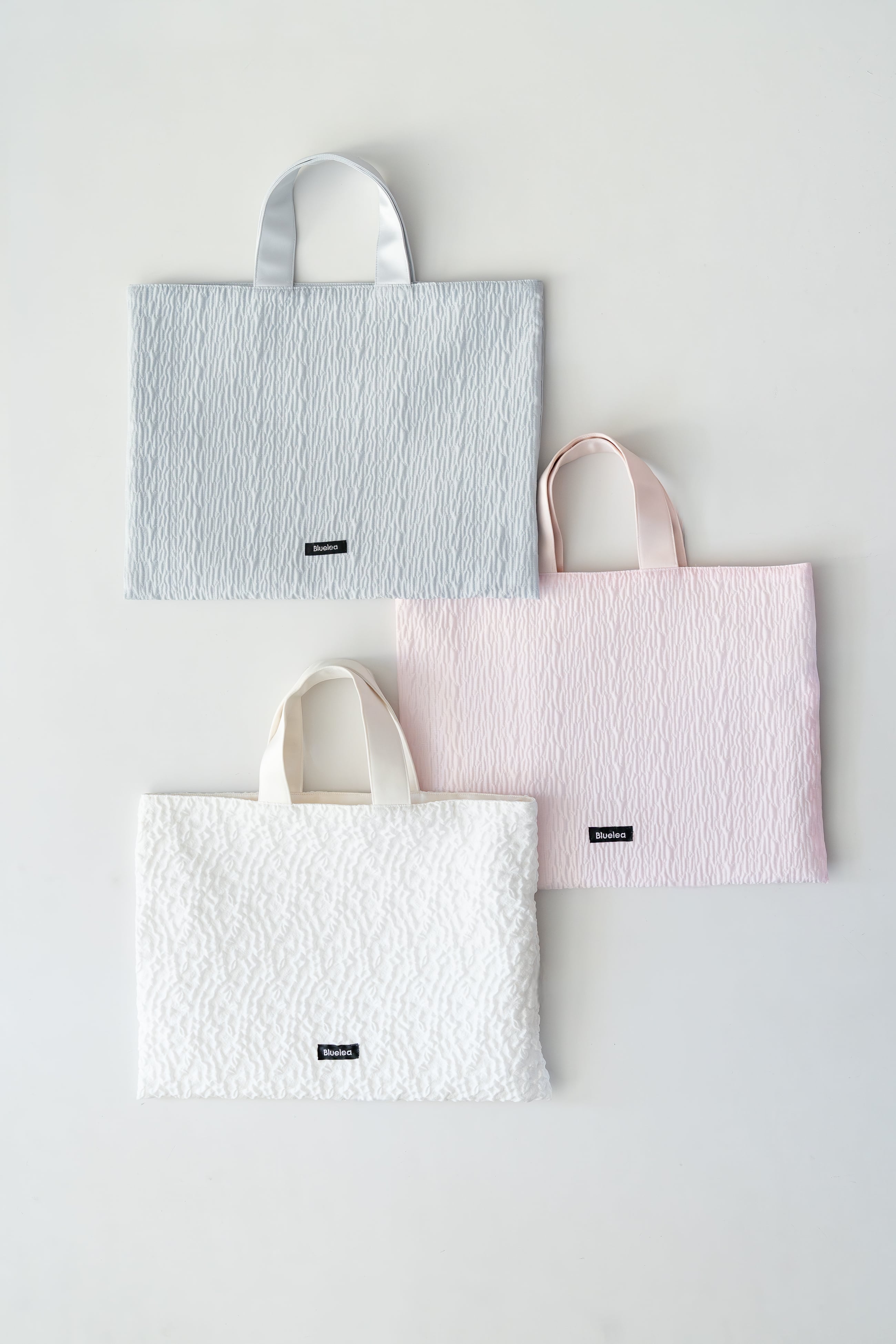 ブルレア Leather trimmed rattan bucketbag Mini Leather Bucket Bag: Your Style Sidekick | Eric Javits