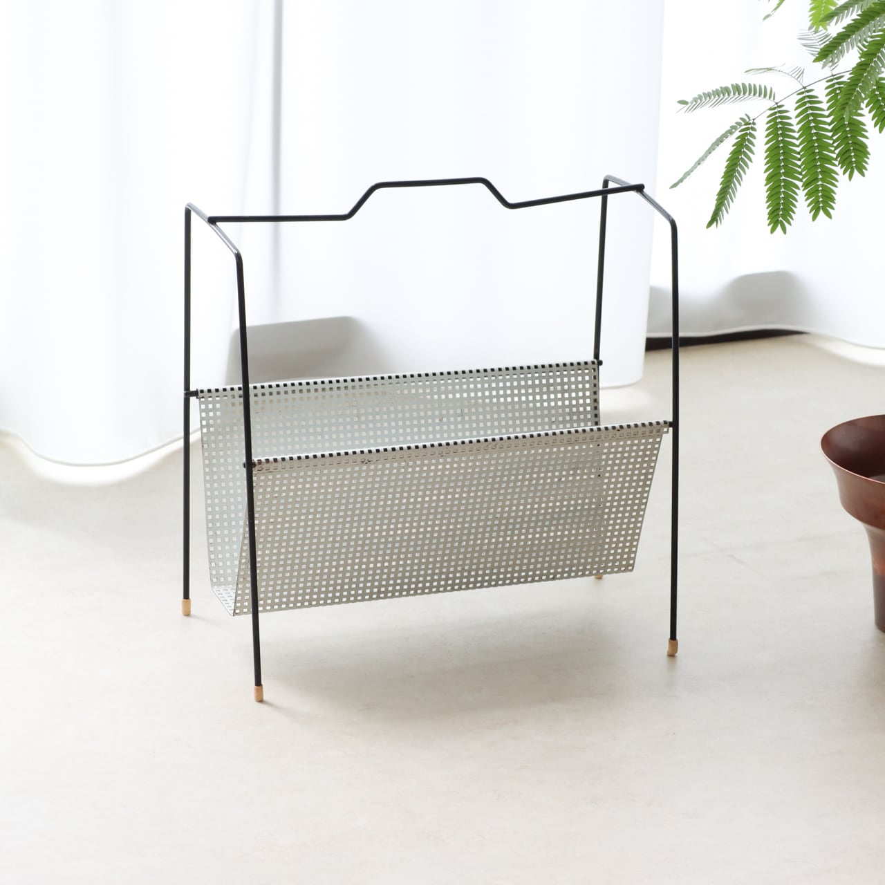 PUNCHING METAL MAGAZINE RACK | 1950-60s | Netherlands