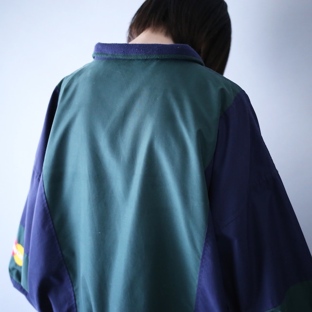 "Master Card" green × navy bi-color switching half-zip pullover