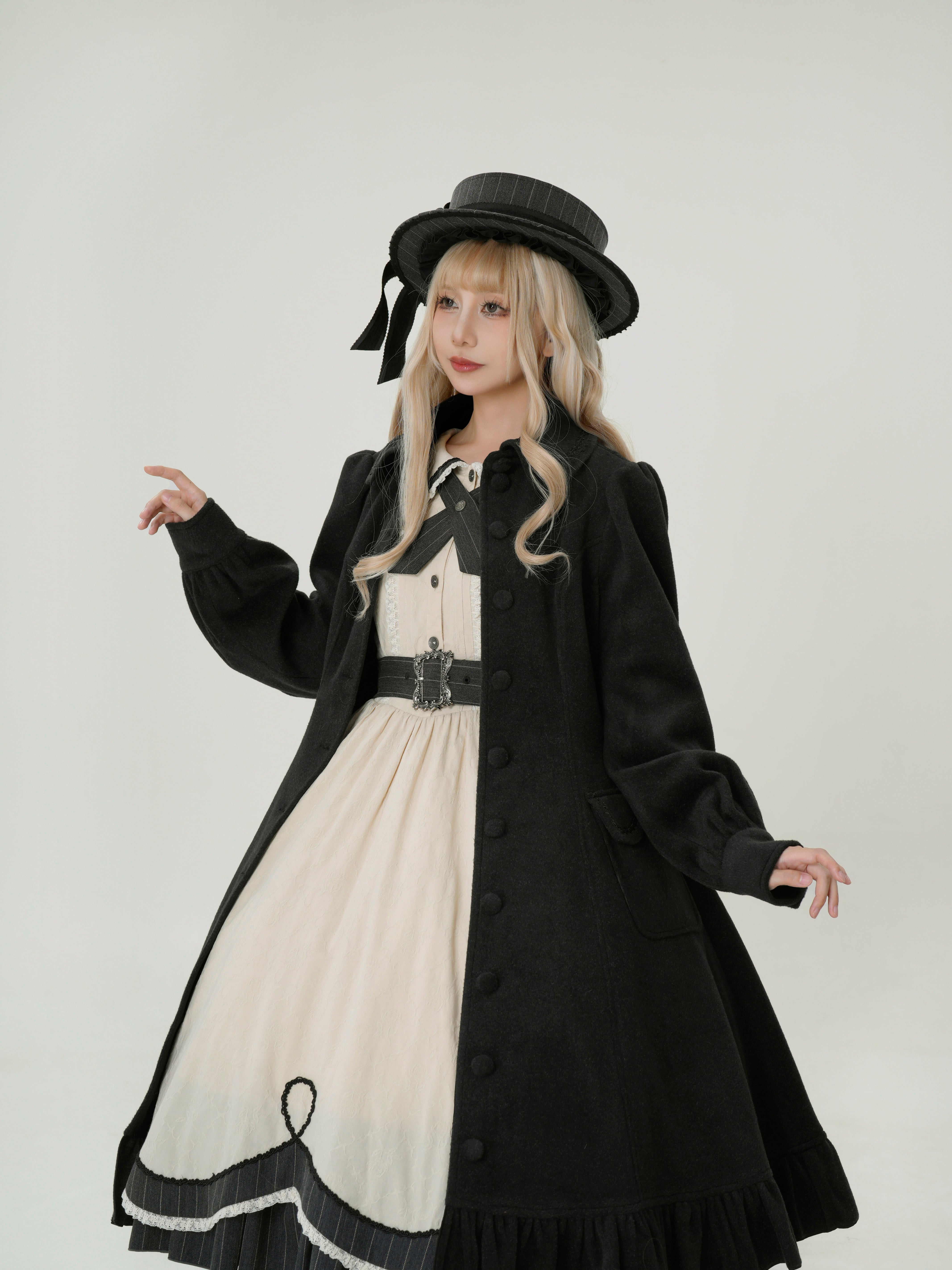 フリルケープ付きコート d77e4b1d8a14e9460a7554a51666f0