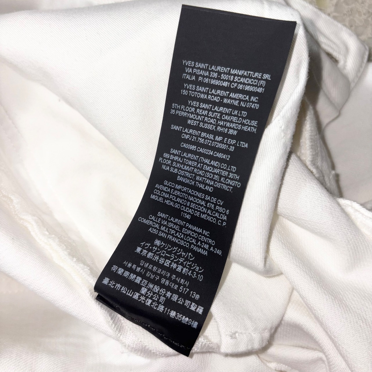 SAINT LAURENT PARIS white denim skinny pants