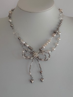 Pearl ribbon necklace.