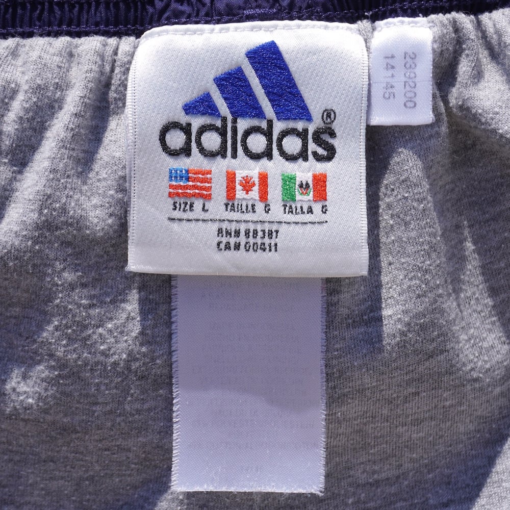 1990's [adidas] 万国旗タグ 3ストライプス&パフォーマンスロゴ