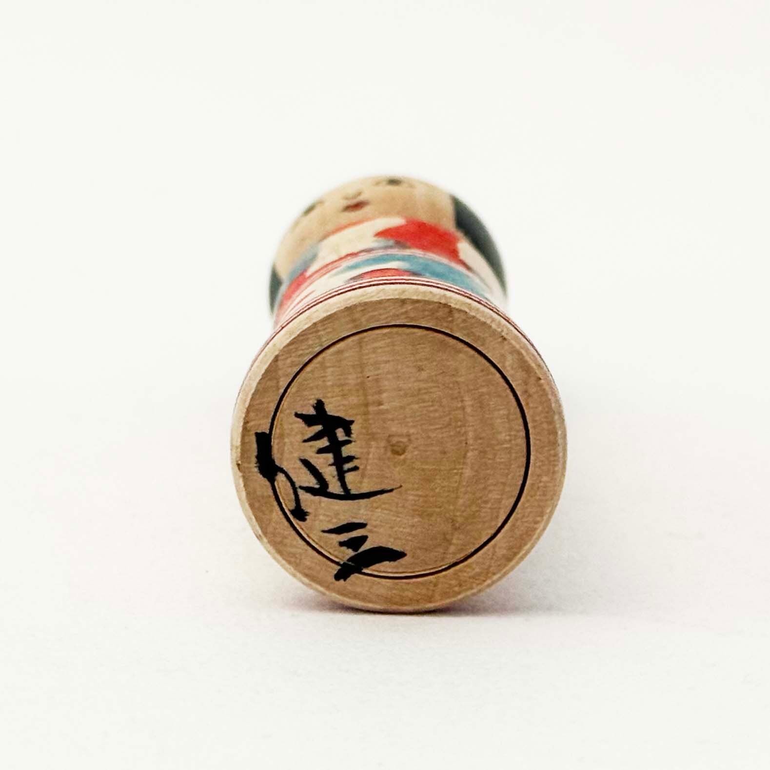 津軽系 / 長谷川健三工人（赤と緑の抽象柄）