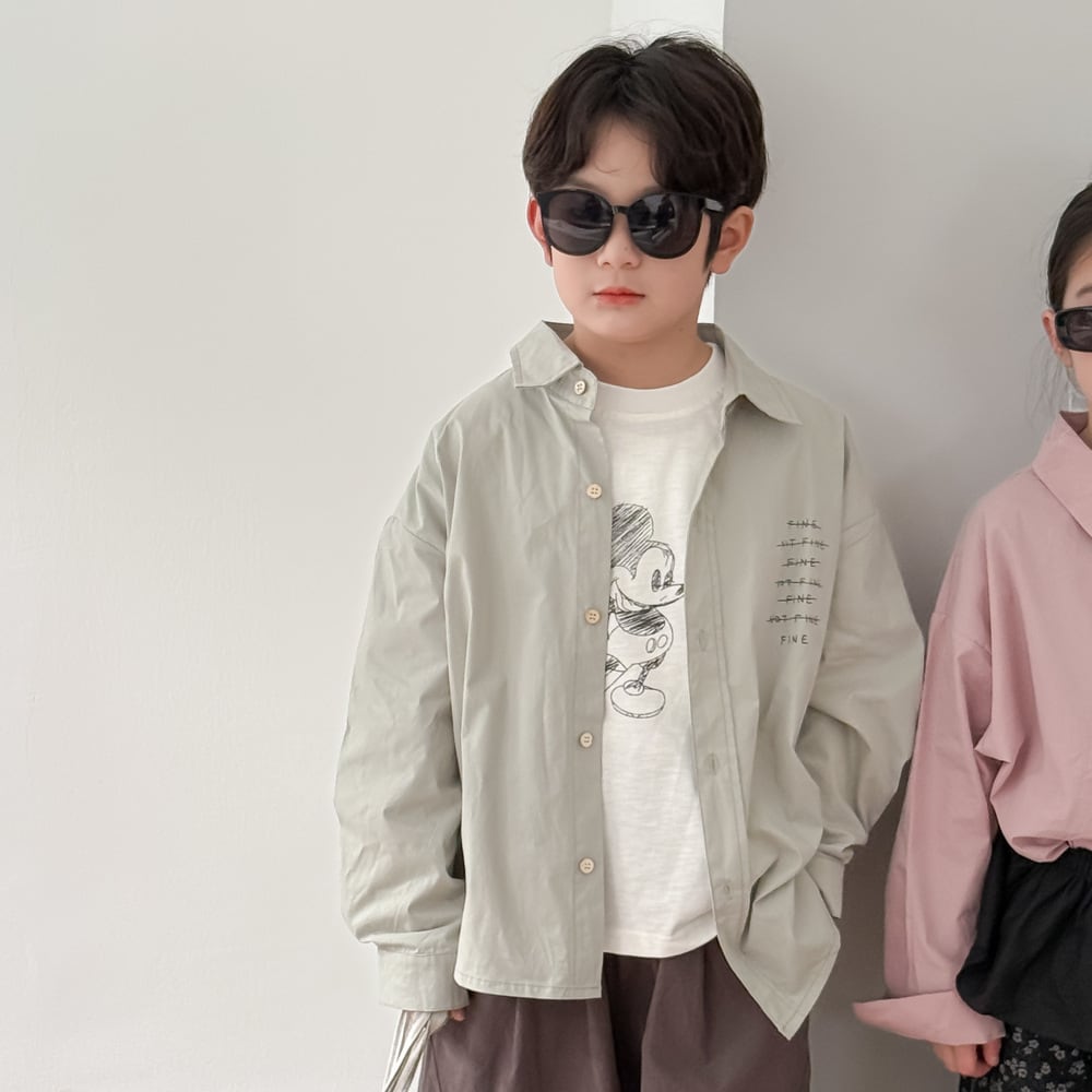 裾デザイン英字シャツ