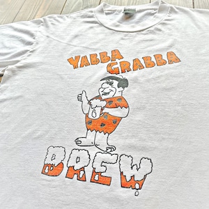 90s 〝 Fred Flintstone 〟 Boot  print T-Shirt  Size about X-LARGE