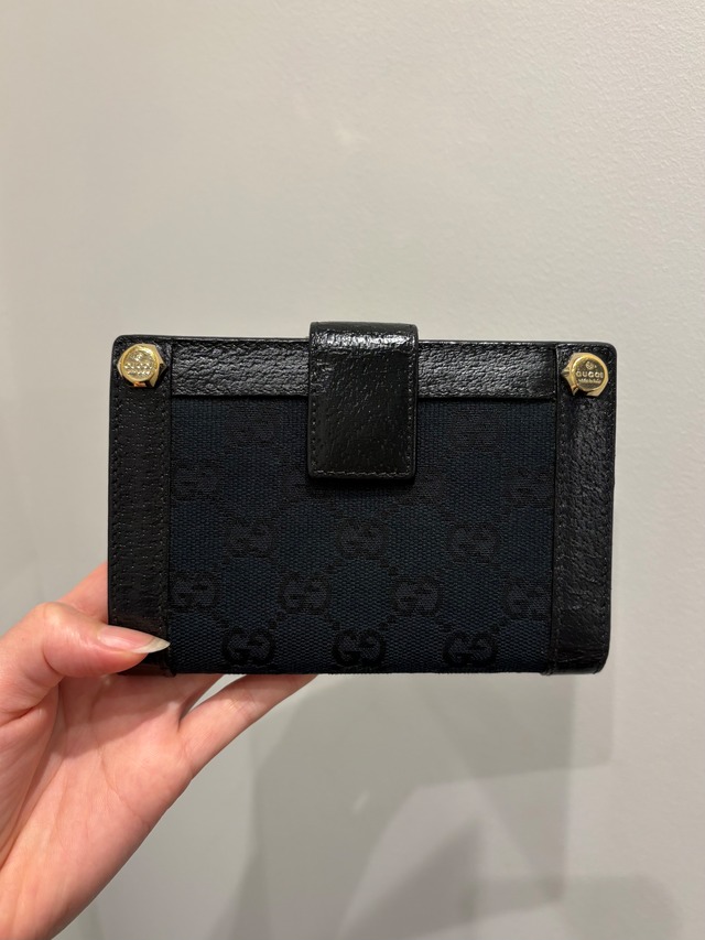 GUCCI/ vintage black monogram wallet.