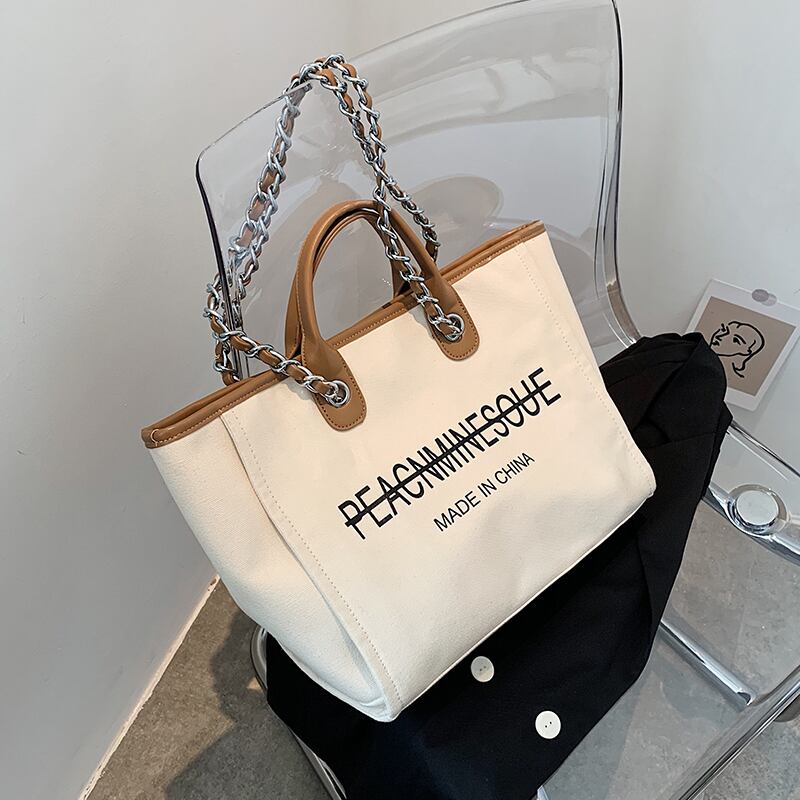 大容量バッグ女性バッグ2020新しいトレンディなワイルドカジュアルキャンバスショルダーバッグ夏のファッショントートバッグ Tiancai_Wing_Bag5138543