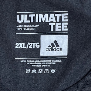 【adidas】2XL ビッグシルエット プリント Tシャツ ラグラン ネブラスカ大学 ハスカーズ NEBRASKA HUSKERS フットボール アディダス ポリシャツ CLIMALITE 半袖 夏物 us古着